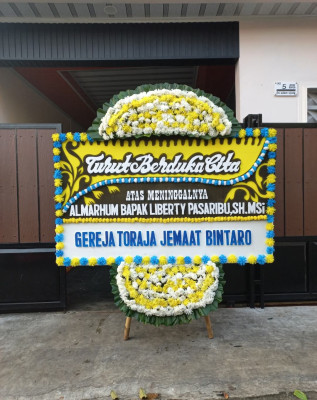 Papan Bunga Duka di Kalipare